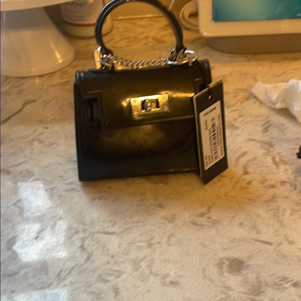 Chic Black Mini Bag with Gold Hardware
